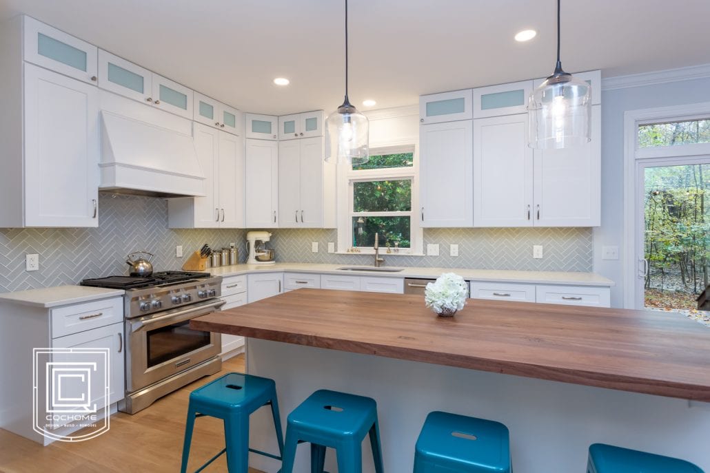  Wood kitchen island with blue stools 