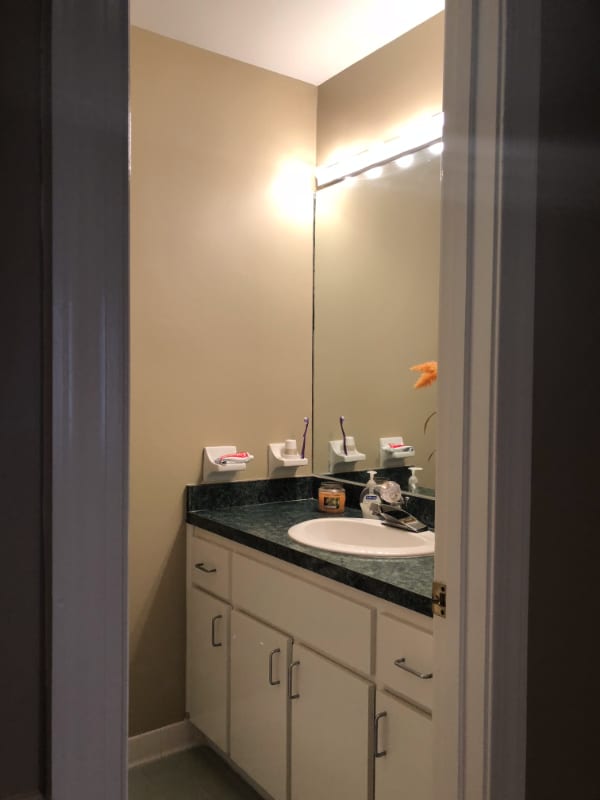 before of small outdated bathroom vanity