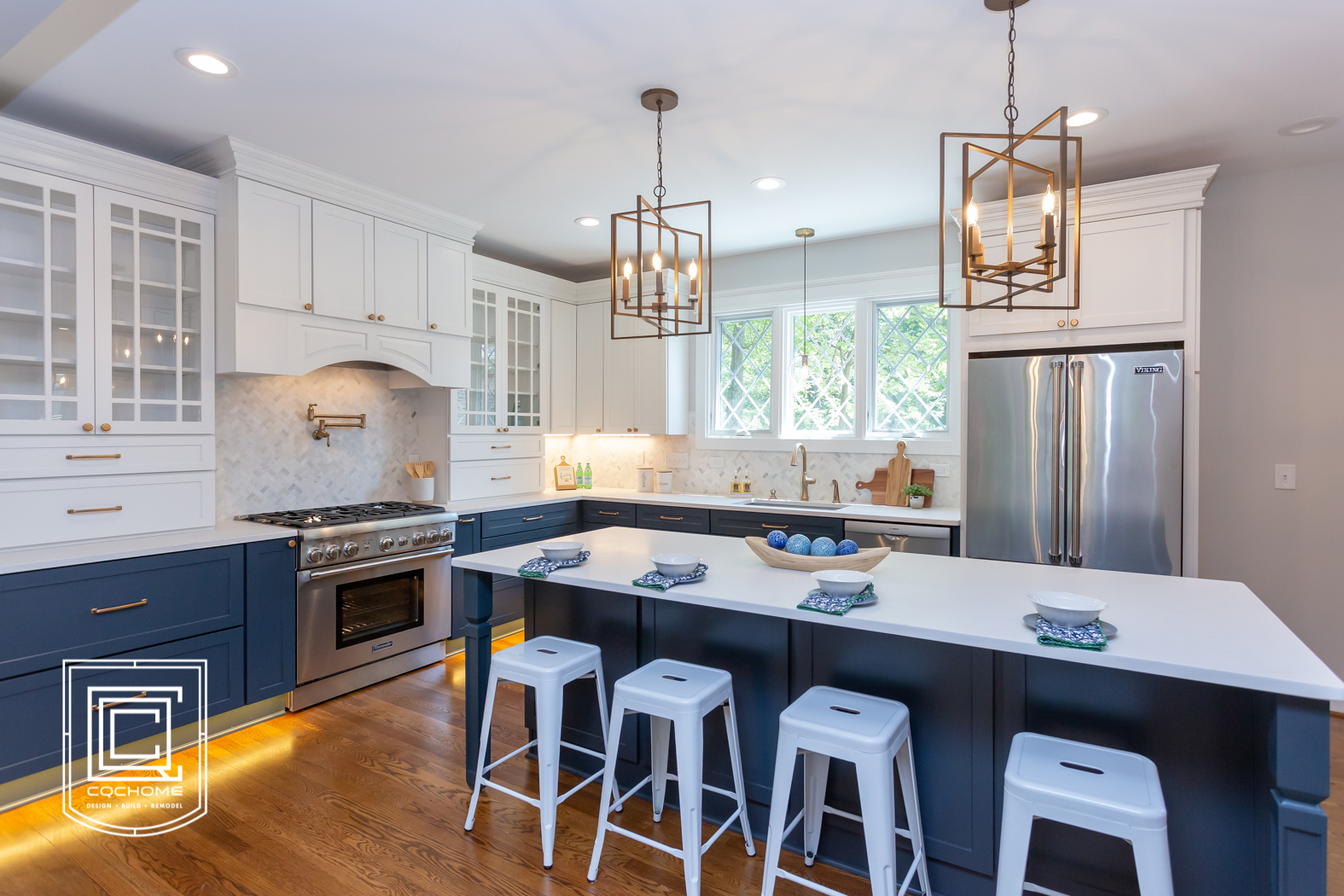  Kitchen Remodel with Navy Cabinets and Champagne Bronze Hardware 